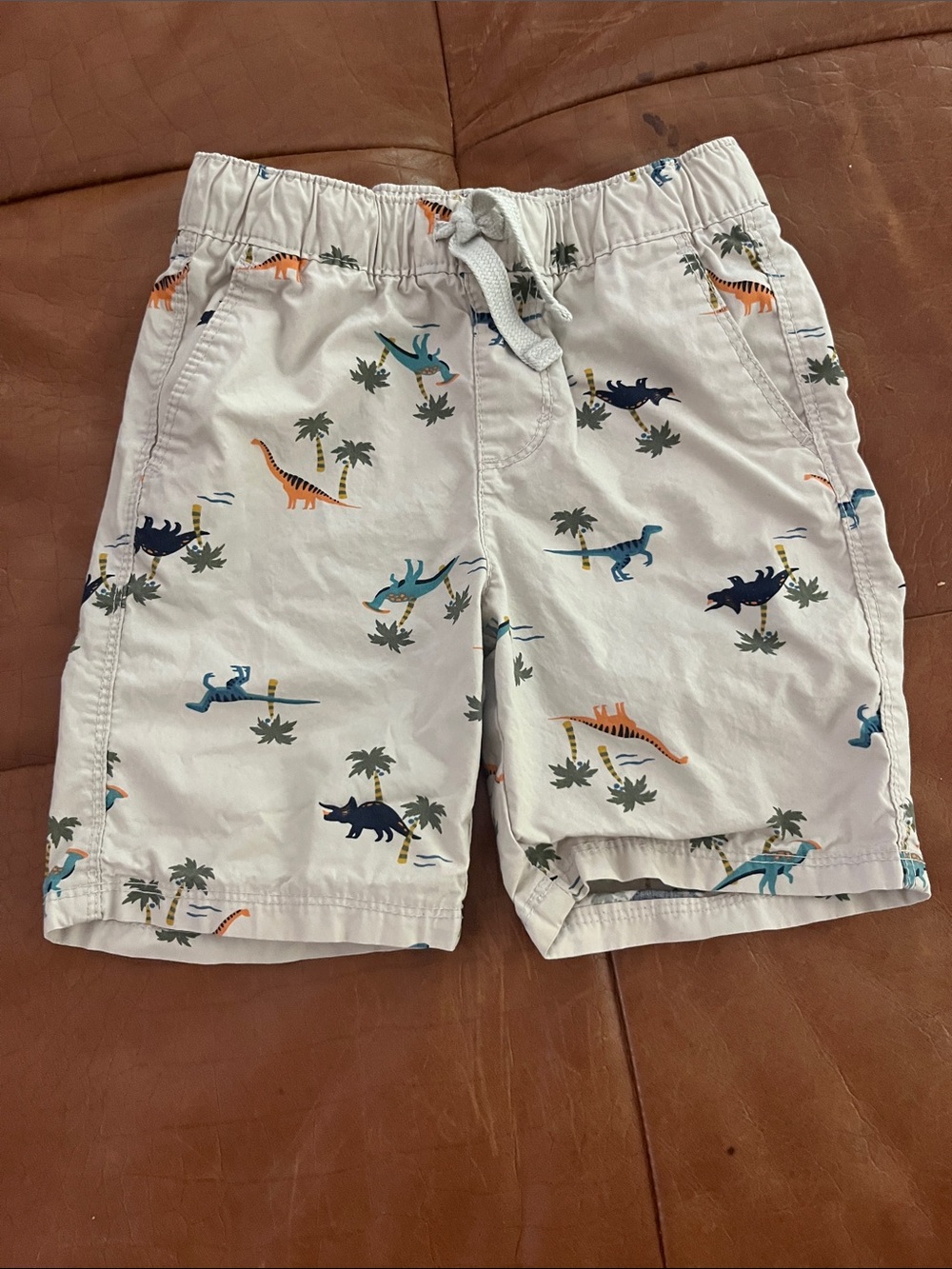 Old Navy White Dinosaur Print Pull-On Shorts with Blue and Orange Accents